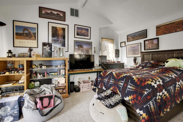 bedroom featuring vaulted ceiling with beams and carpet floors