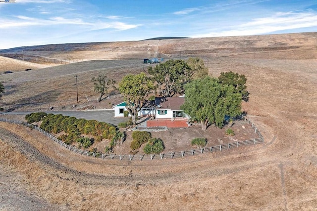 birds eye view of property featuring a rural view