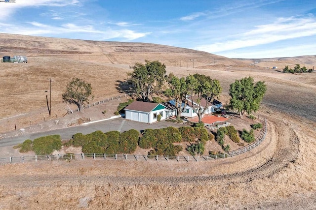 aerial view with a mountain view and a rural view