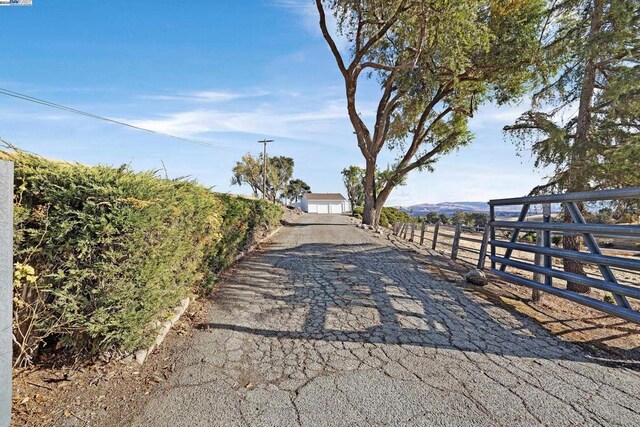 view of road with a rural view