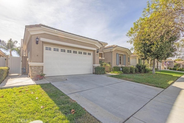 view of front facade featuring a front yard and a garage