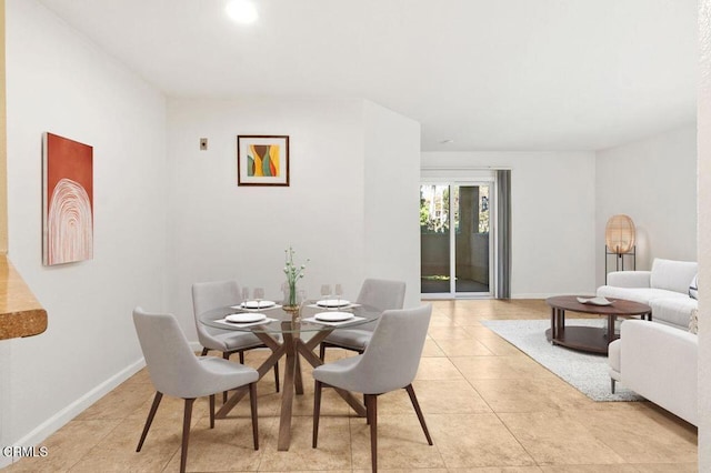 view of tiled dining space