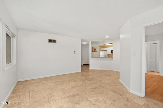 unfurnished room featuring light wood-type flooring