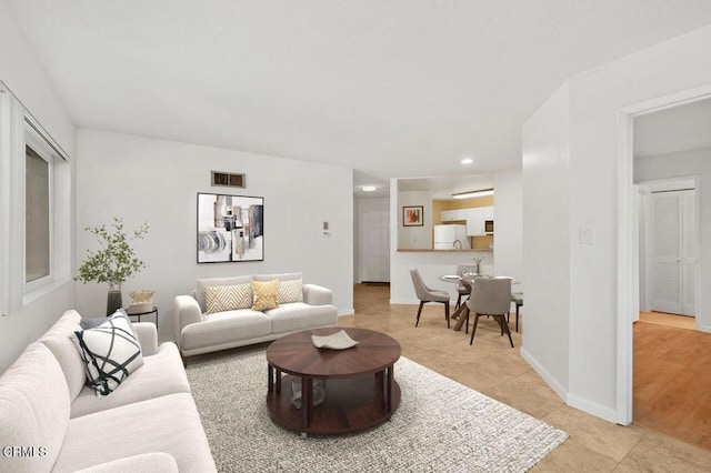 living room featuring light hardwood / wood-style floors