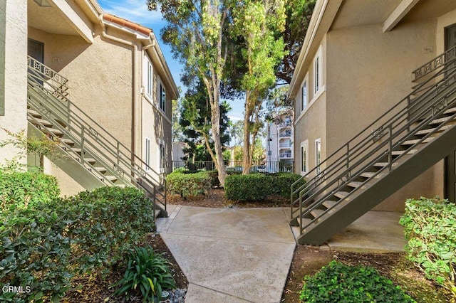 surrounding community with a patio area