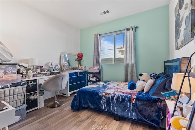 bedroom featuring hardwood / wood-style floors