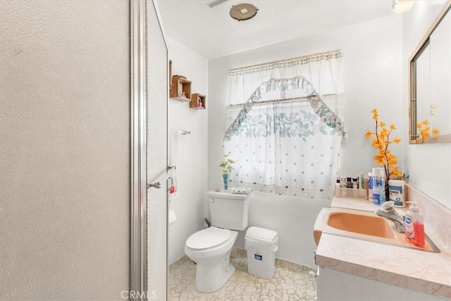 bathroom with tile patterned floors, vanity, and toilet