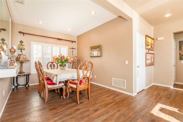 dining room featuring dark wood-type flooring