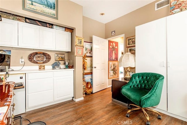 living area with wood-type flooring