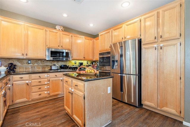 kitchen with decorative backsplash, a kitchen island, dark hardwood / wood-style flooring, and stainless steel appliances