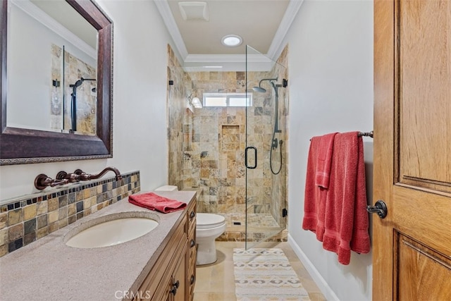 bathroom featuring toilet, crown molding, walk in shower, vanity, and backsplash