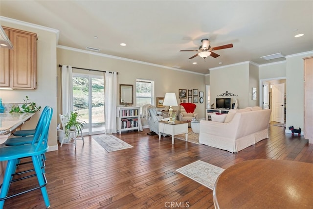 living room featuring ceiling fan, crown molding, and dark wood-type flooring