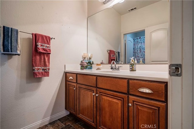 bathroom featuring vanity