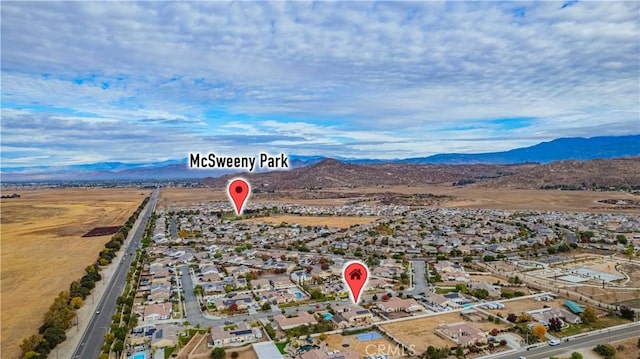 bird's eye view with a mountain view