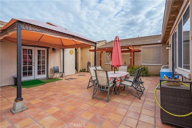 view of patio / terrace featuring a gazebo and french doors