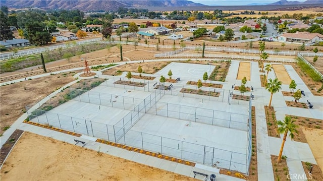 birds eye view of property with a mountain view