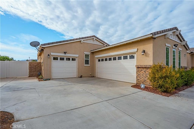 view of property exterior with a garage