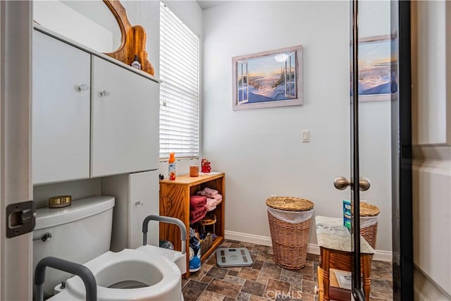 bathroom with toilet and a bidet