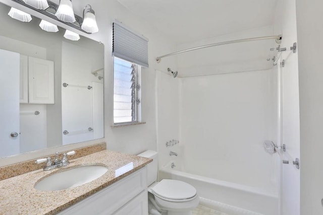 full bathroom with vanity, toilet, and shower / washtub combination