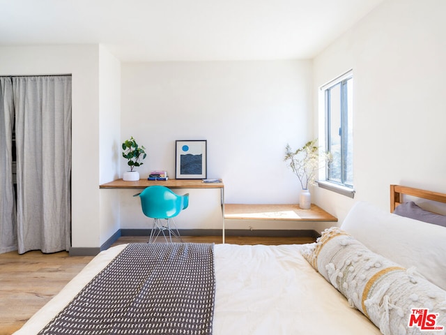 bedroom featuring hardwood / wood-style floors