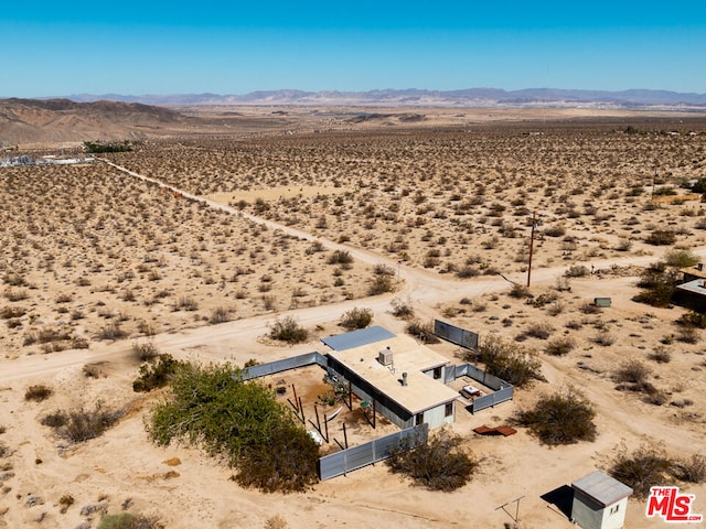 drone / aerial view featuring a mountain view