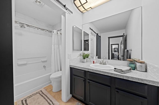 full bathroom with shower / bath combination with curtain, vanity, and toilet