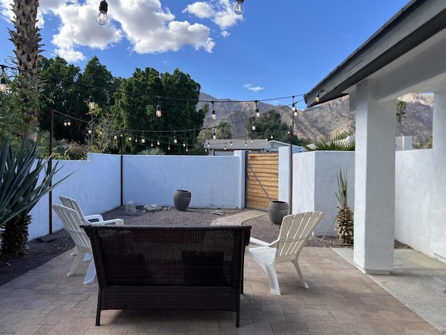 view of patio featuring a mountain view