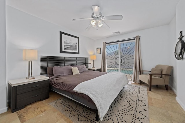 bedroom with access to exterior and ceiling fan