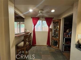 dining room with ceiling fan