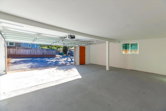 garage featuring a garage door opener