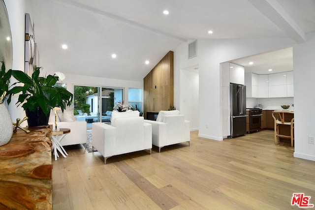 living room with beam ceiling, high vaulted ceiling, and light hardwood / wood-style floors