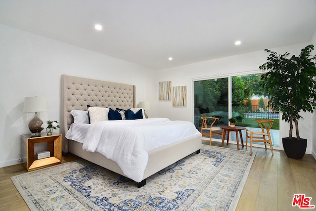 bedroom featuring light hardwood / wood-style floors