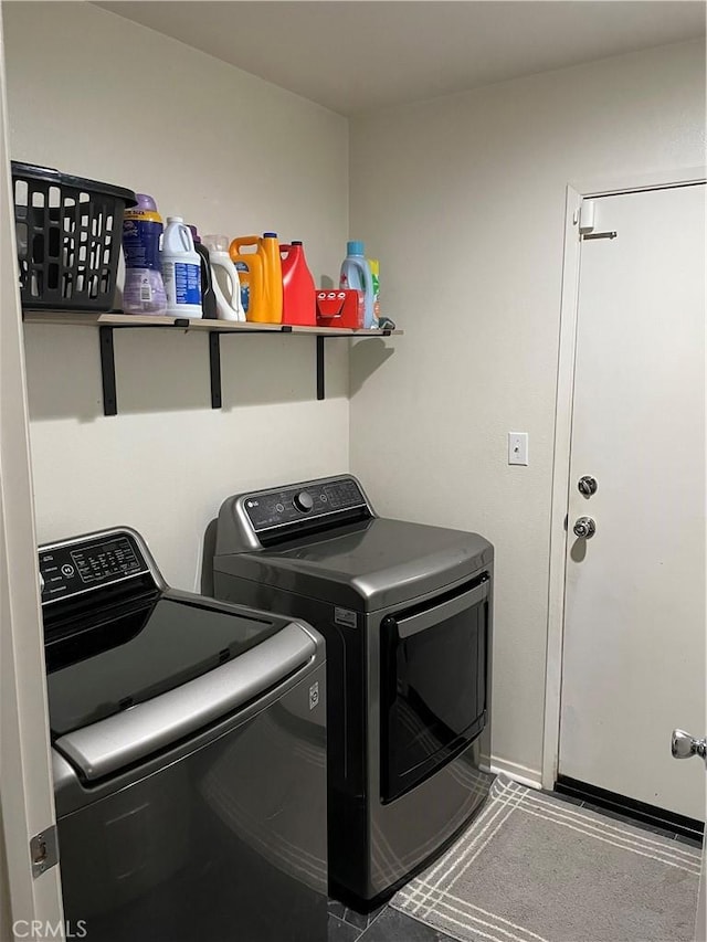 laundry room featuring washing machine and dryer