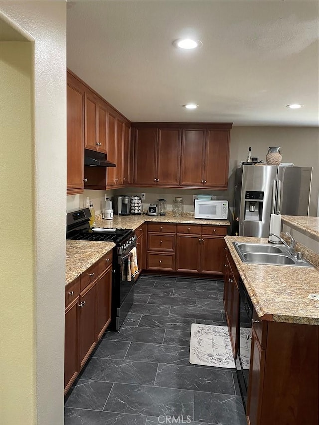 kitchen with sink and black appliances