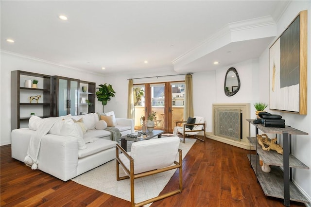 living room with french doors, dark hardwood / wood-style floors, and ornamental molding