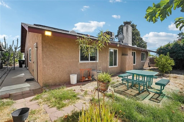 rear view of house with a patio area