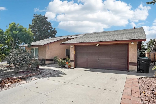 ranch-style home with a garage