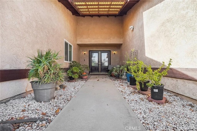 doorway to property featuring french doors