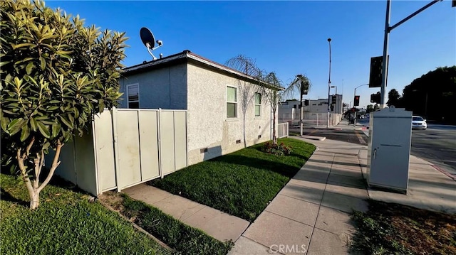 view of property exterior featuring central AC