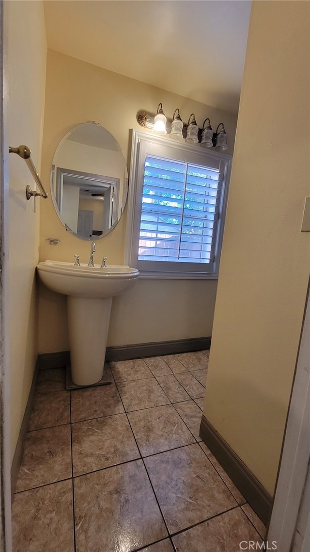 bathroom featuring tile patterned flooring