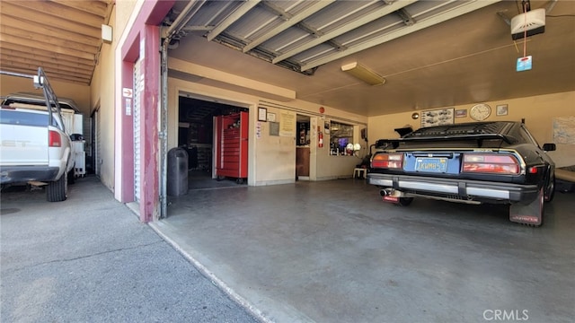 garage featuring a garage door opener