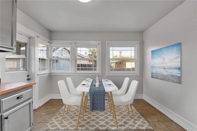 view of tiled dining space