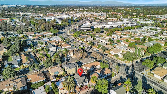 drone / aerial view featuring a mountain view