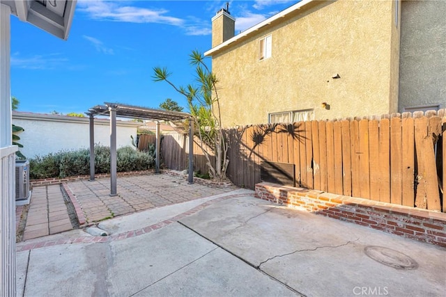 view of patio / terrace featuring a pergola