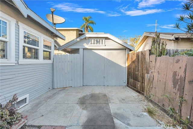 view of patio with a storage unit