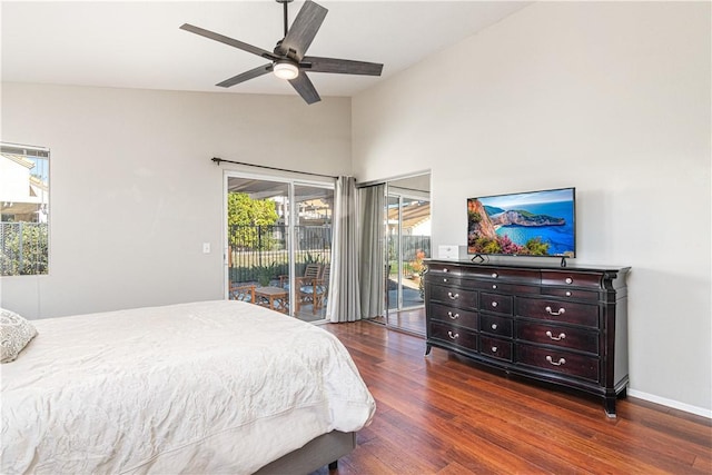 bedroom featuring ceiling fan, lofted ceiling, dark wood-type flooring, and access to outside