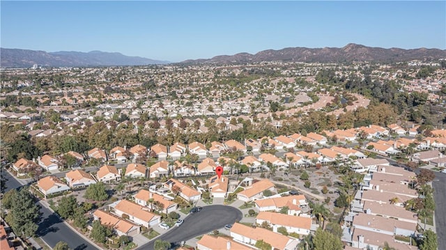 drone / aerial view featuring a mountain view