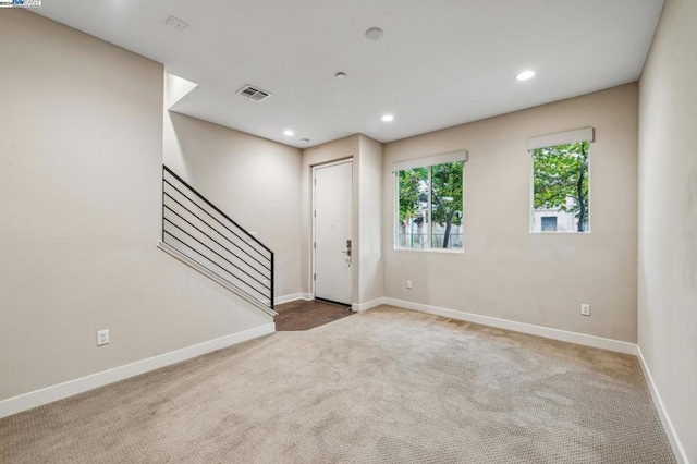 view of carpeted spare room