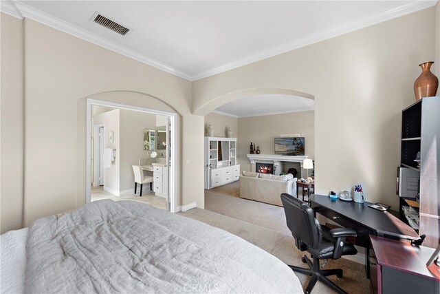 carpeted bedroom featuring ornamental molding