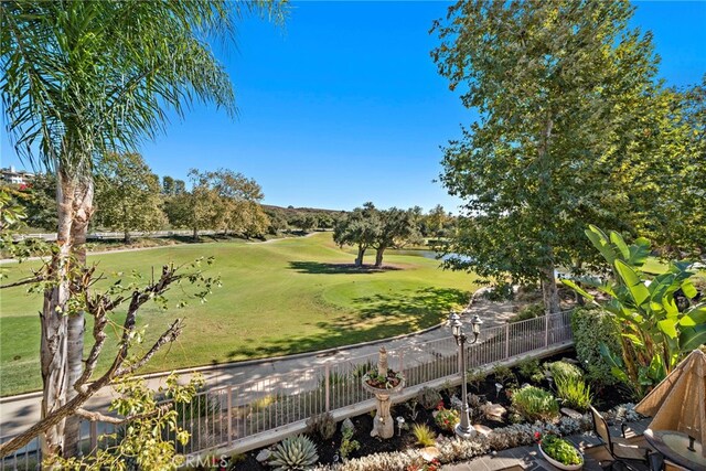 view of home's community featuring a lawn